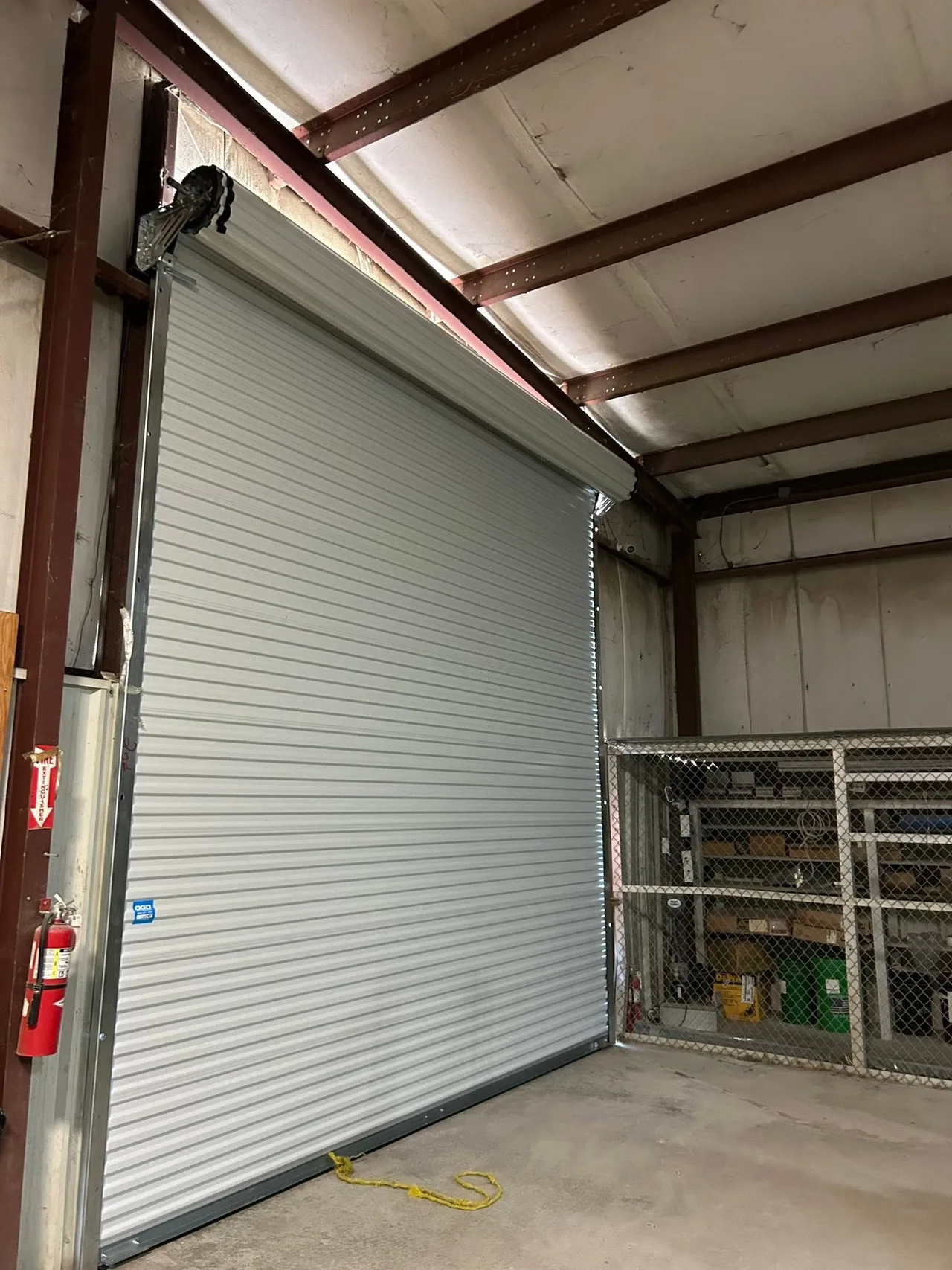 A rolling steel door in a metal shop