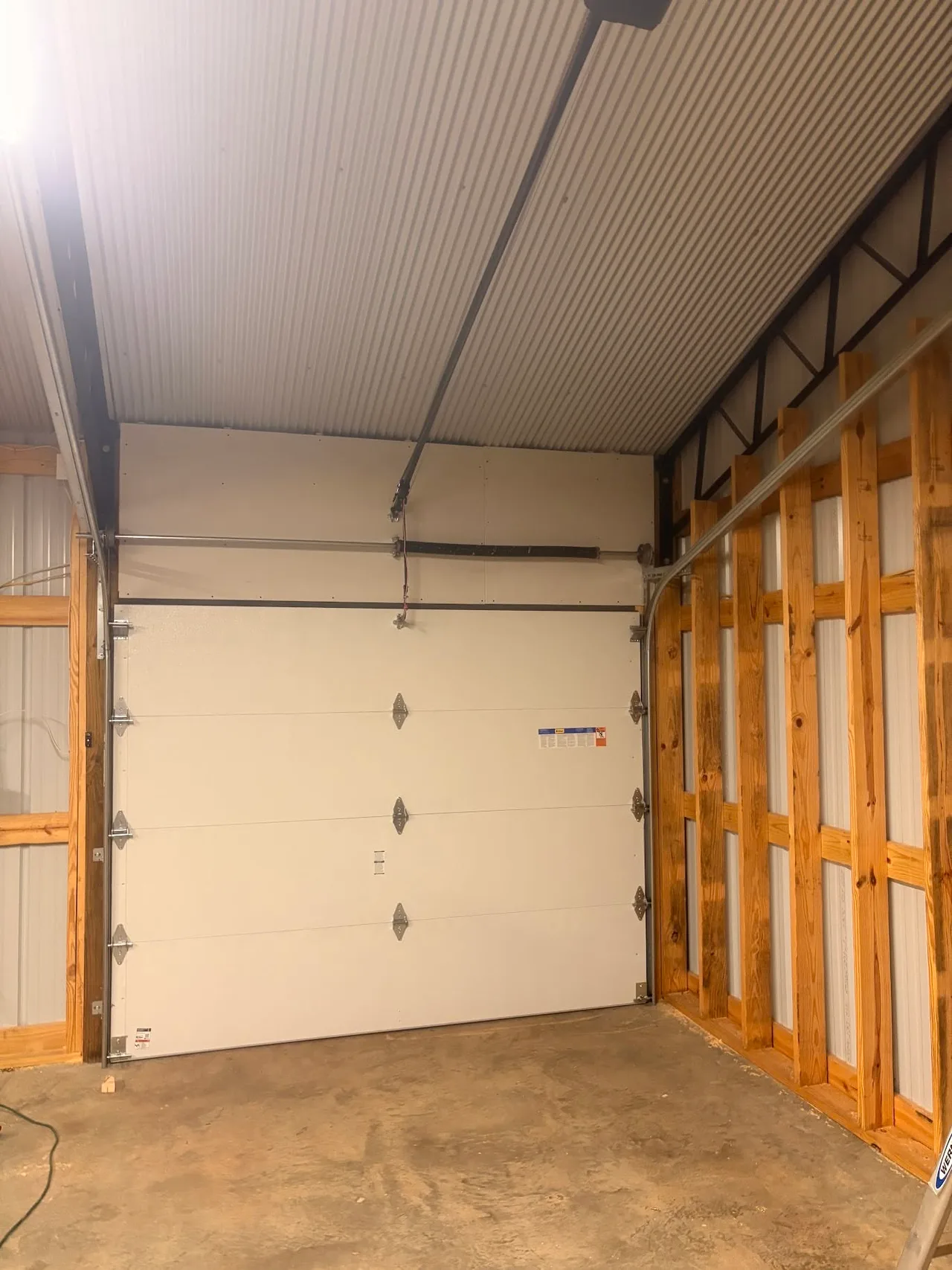 A white door from inside the garage